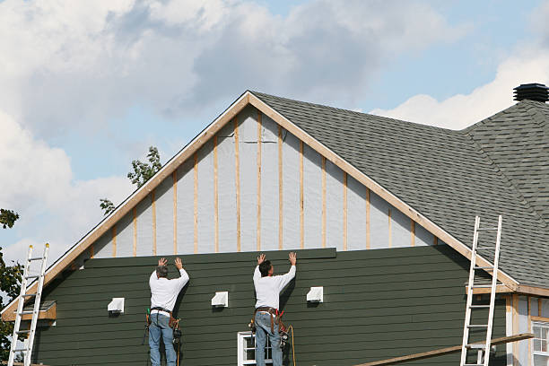Professional Emergency Siding Repair technician working in Greensboro, MD